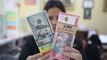 Rupiah Ditutup Level Rp16.437,5 per Dolar AS Jelang Akhir Pekan