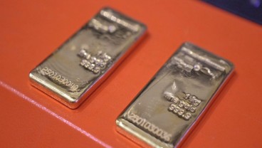 Ketegangan Dagang Mereda, Harga Emas Melemah Dua Pekan Beruntun