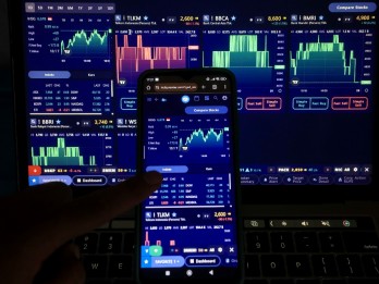 IHSG Dibuka Naik ke Zona Hijau, Saham ANTM, BMRI, hingga PTRO Menguat