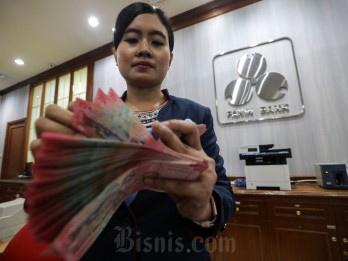 Rupiah Ditutup Melemah ke Rp16.536 per Dolar AS