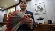 Rupiah Ditutup Melemah ke Rp16.536 per Dolar AS