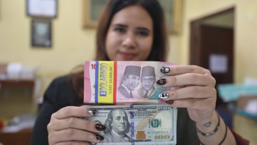 Rupiah Akhir Pekan Ditutup Melemah Sentuh Level Rp16.520 per Dolar AS