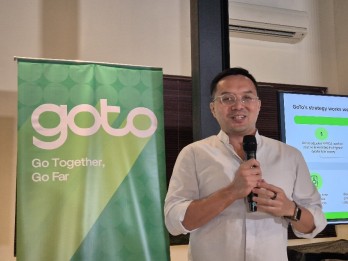 Grab Bantah Rumor Merger, Saham GOTO Terperosok ke Zona Merah