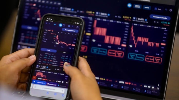 IHSG Melemah Level 7.094,60, Saham BMRI, ADRO, ASII ke Zona Merah