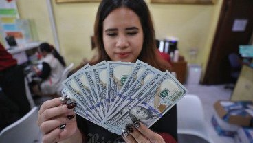 Dolar AS Merangkak Naik, Rupiah Dibuka Lesu ke Level Rp16.295