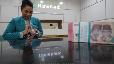 Rupiah Dibuka Melemah Sentuh Rp16.307 per Dolar AS