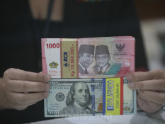 Rupiah Ditutup Melemah, Sentuh Level Rp16.239 per Dolar AS