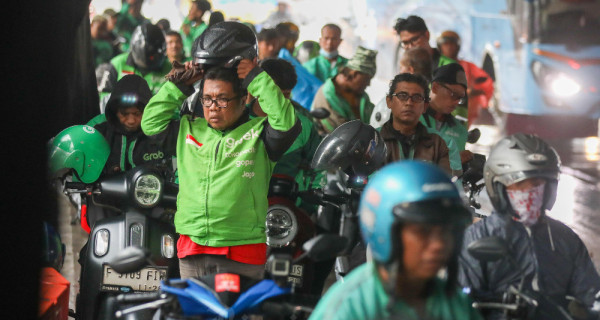 GOTO vs Grab: Adu Profit Raksasa Teknologi Asean, Siapa Lebih Unggul?