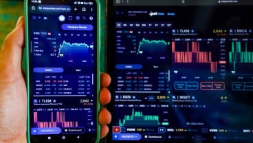Indeks Bisnis-27 Ditutup Pada Zona Merah Tertekan Saham AMRT, BRPT, ISAT