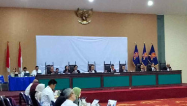 Simalakama Putusan KPPU Menyoal Kartel Bunga Pinjol