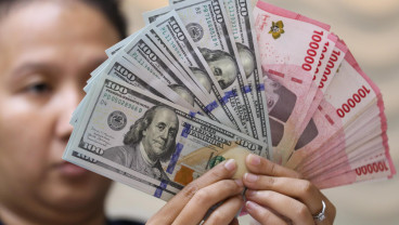 Rupiah Ditutup Melemah ke Rp17.907 di Tengah Penantian Data Ekonomi AS