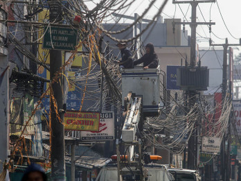 Pemkab Bogor dan APJATEL Tata 18 Km Kabel Udara di Jalan Raya Bogor-Jakarta