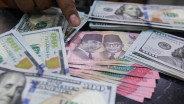 Perry Warjiyo Mundur, Rupiah Ditutup Melemah Sentuh Rp18.009 per Dolar AS