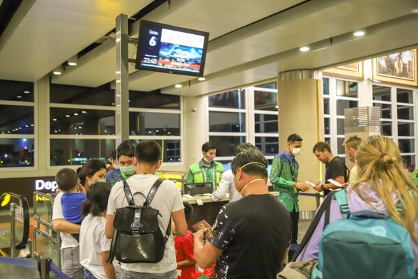 Foto-foto Penerbangan ke China Terakhir dari Ngurah Rai