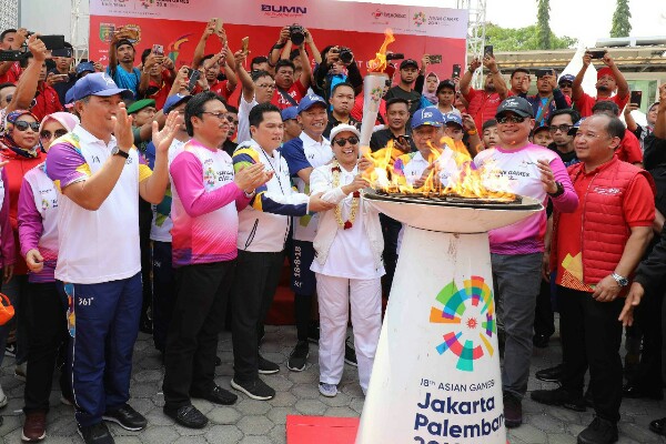 Ikut Torch Relay, Menteri Rini Apresiasi Dukungan BUMN Sukseskan Asian Games 2018