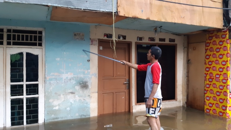 Cerita Korban Banjir yang Terimpit Gedung Bertingkat