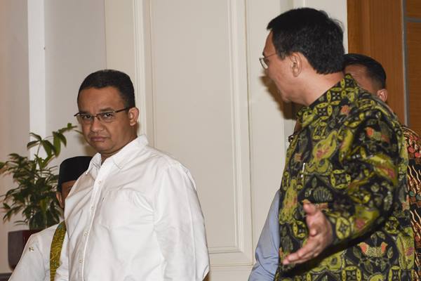 Sikap Hangat Ahok Terima Anies Baswedan