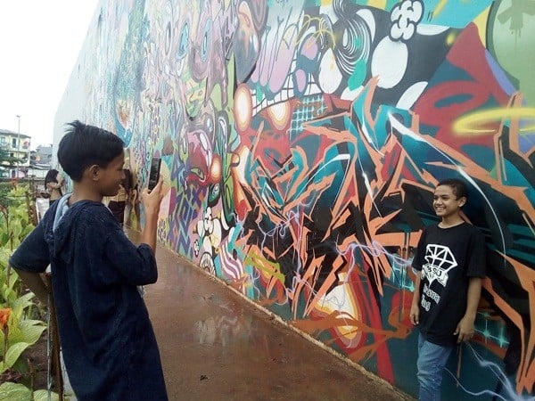 Goresan Mural RTH Kalijodo Jadi Magnet Muda-Mudi Ibu Kota