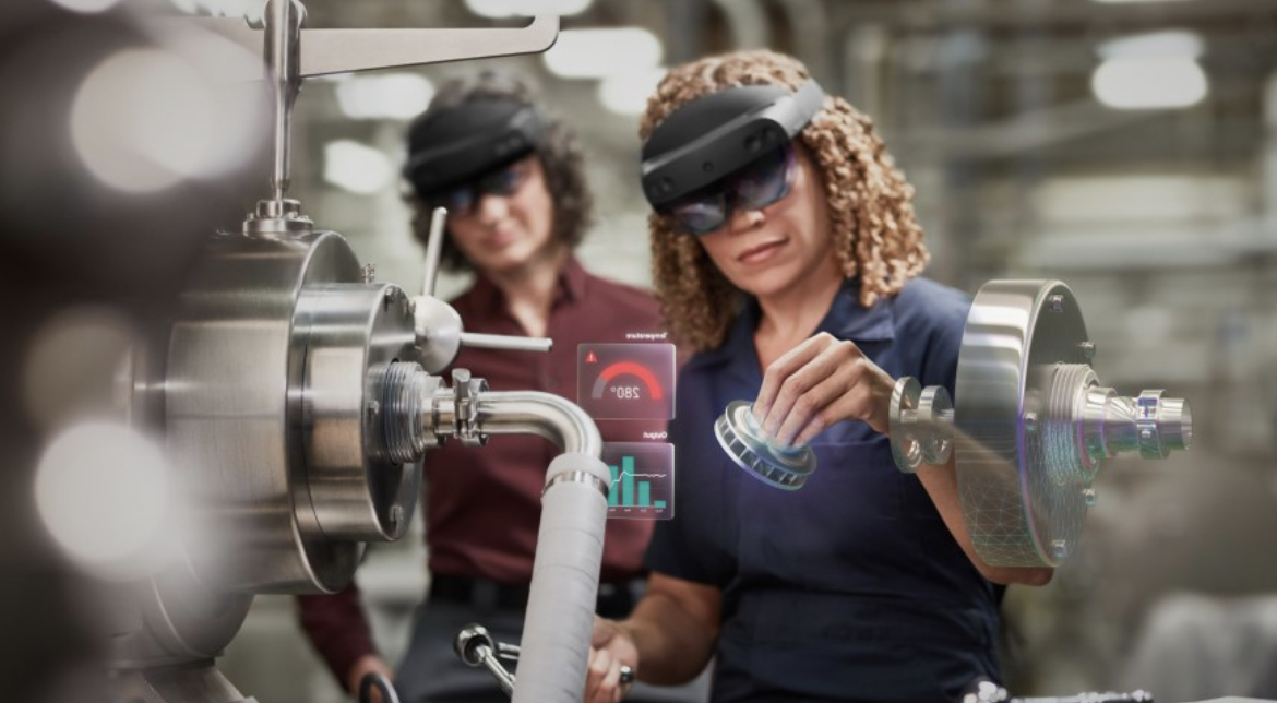 Pengguna menggunakan kacamatar VR untuk memperbaiki mesin/dok Microsoft